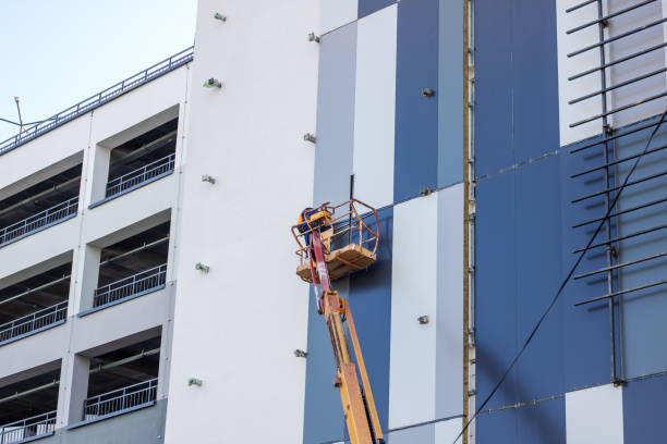 Office building exterior being painted with clean architectural panels and durable commercial coatings by a commercial painter in Beverly Hills, CA.