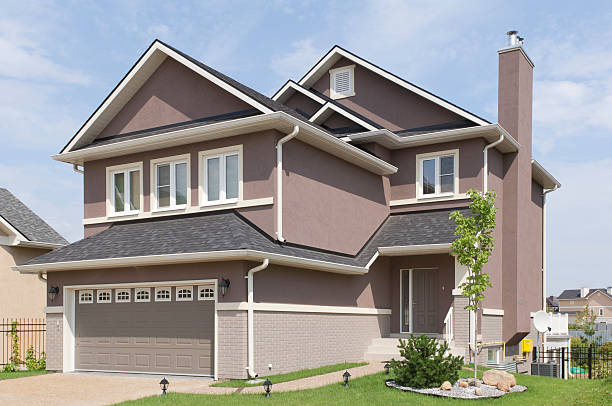 Warm taupe exterior paint finish with cream trim by an exterior painter in Orange County, CA.