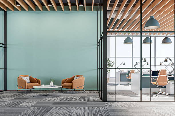 Office interior with teal accent wall and contrasting trim finishes by a painting company in Irvine, CA.
