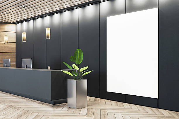 Office reception area with dark painted walls and wood ceiling accents by a painting company in Irvine, CA