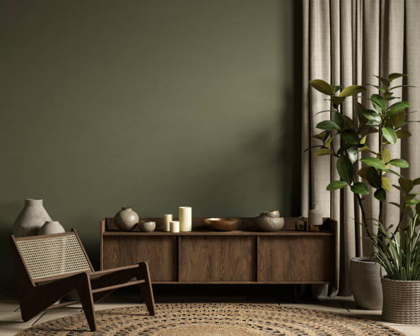 Living room with deep olive-green wall color and complementary trim details by an interior painter in Irvine, CA.